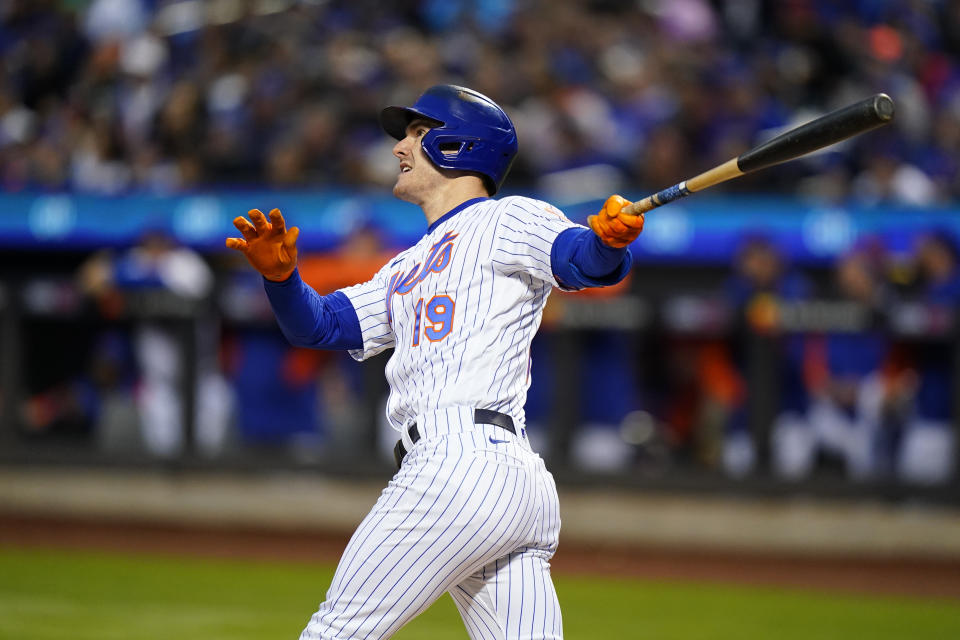 New York Mets' Mark Canha follows through on a three-run home run against the Washington Nationals during the first inning of a baseball game Wednesday, Oct. 5, 2022, in New York. (AP Photo/Frank Franklin II)