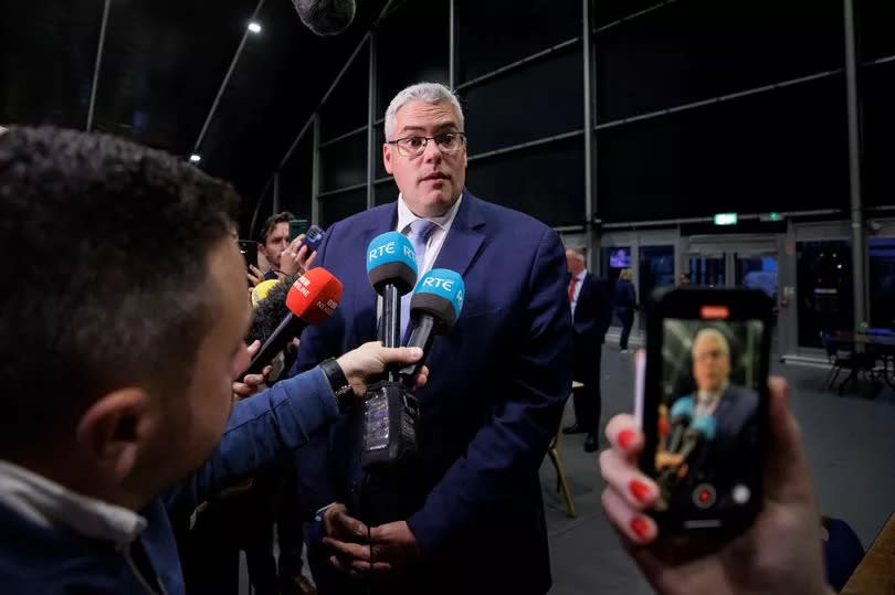 DUP leader Gavin Robinson speaks to the media at the Titanic Exhibition Centre in Belfast