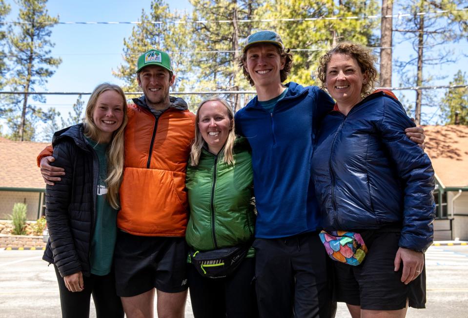 PCT hikers Katherine Schumacher (from left), Tommy Slabaugh, Allison Irwin, Jackson Hawkins and Leonie Short pose for a photo together while taking a rest from the Pacific Crest Trail in Idyllwild, Calif., Thursday, May 11, 2023. 