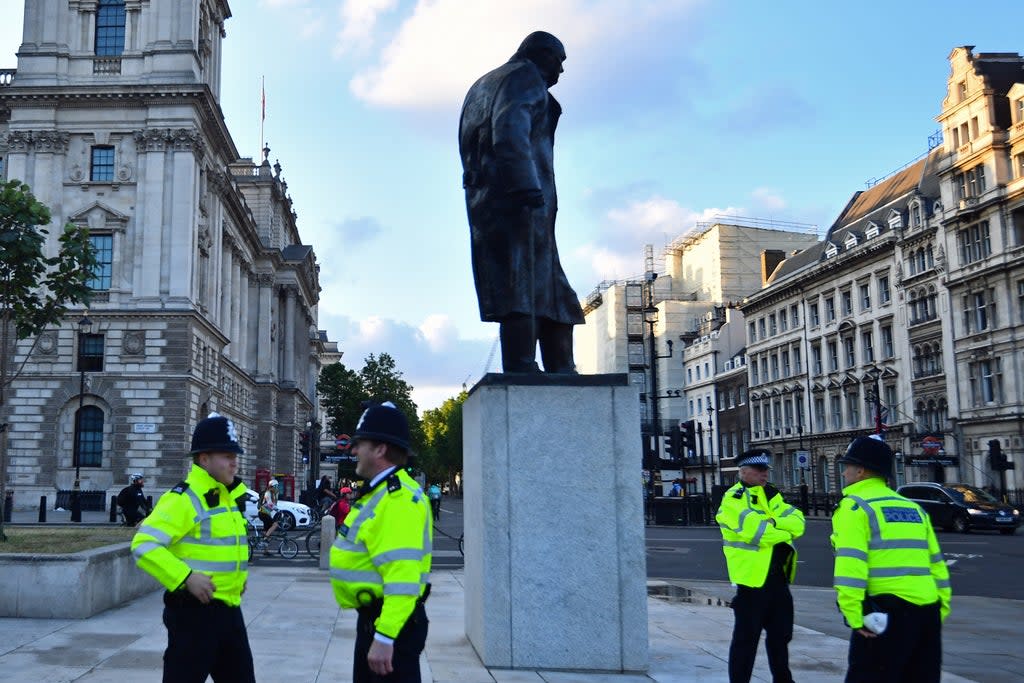 Police presence at the Winston Churchill statue on Parliament Square, London (PA) (PA Archive)