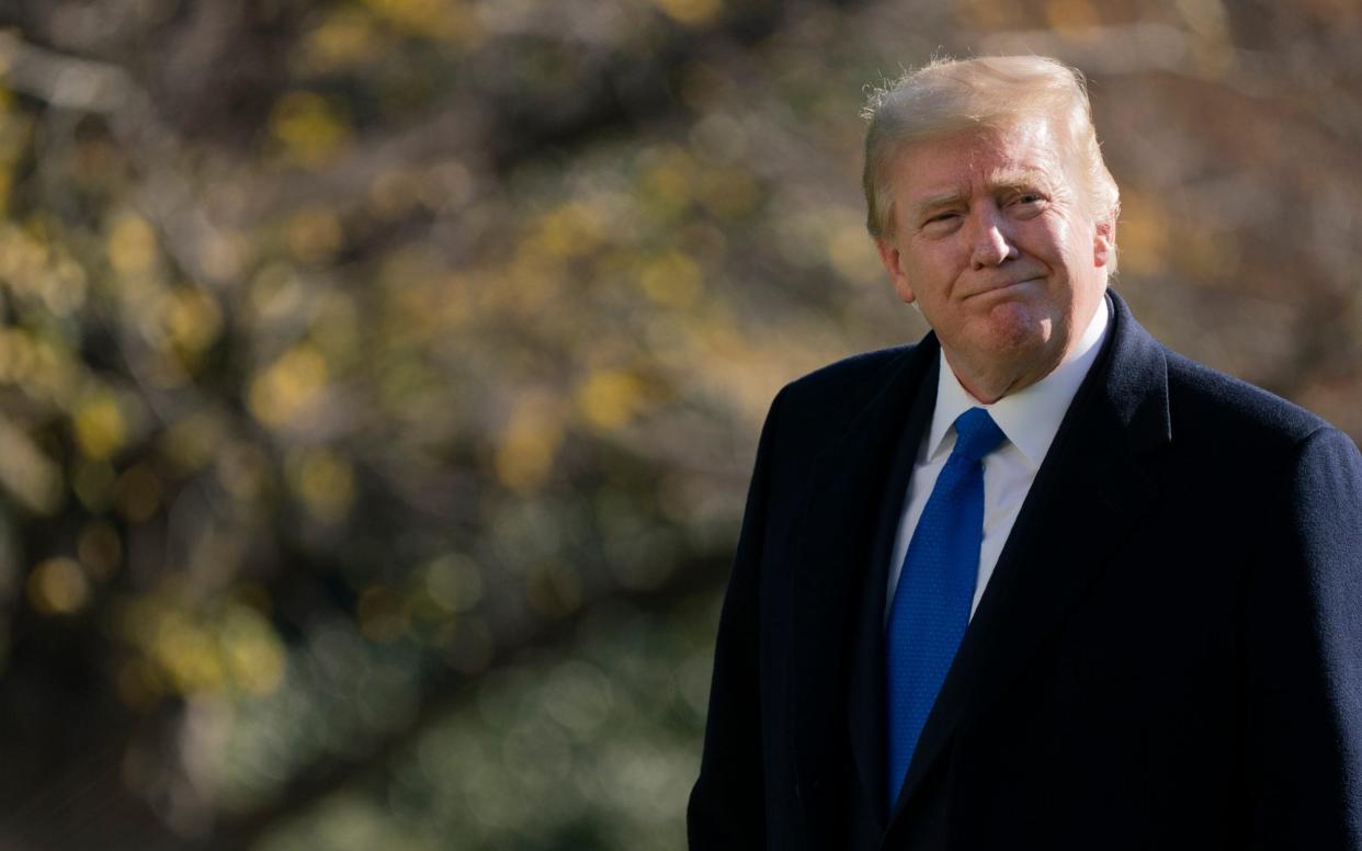 Donald Trump pictured on November 29 returning from Camp David - Patrick Semansky /AP