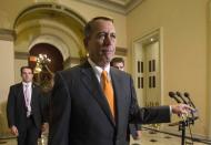 Speaker of the House John Boehner walks to the House floor during the vote on the fiscal deal in the U.S. Capitol in Washington October 16, 2013. The U.S. Congress on Wednesday approved an 11th-hour deal to end a partial government shutdown and pull the world�s biggest economy back from the brink of a historic debt default that could have threatened financial calamity. REUTERS/Kevin Lamarque (UNITED STATES - Tags: POLITICS BUSINESS)