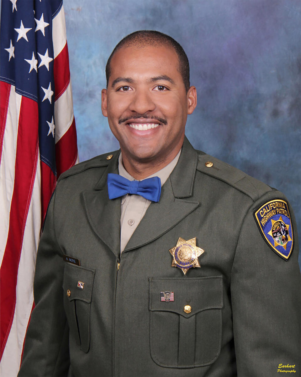 In this undated photo release by the California Highway Patrol, Officer Andre Moye Jr. A driver stopped by police pulled out a rifle and opened fire, killing Moye and wounding a few others during a shootout on a freeway overpass that left the gunman dead and sent terrified motorists running for cover. (David Earhart/Earhart Photography/California Highway Patrol via AP)