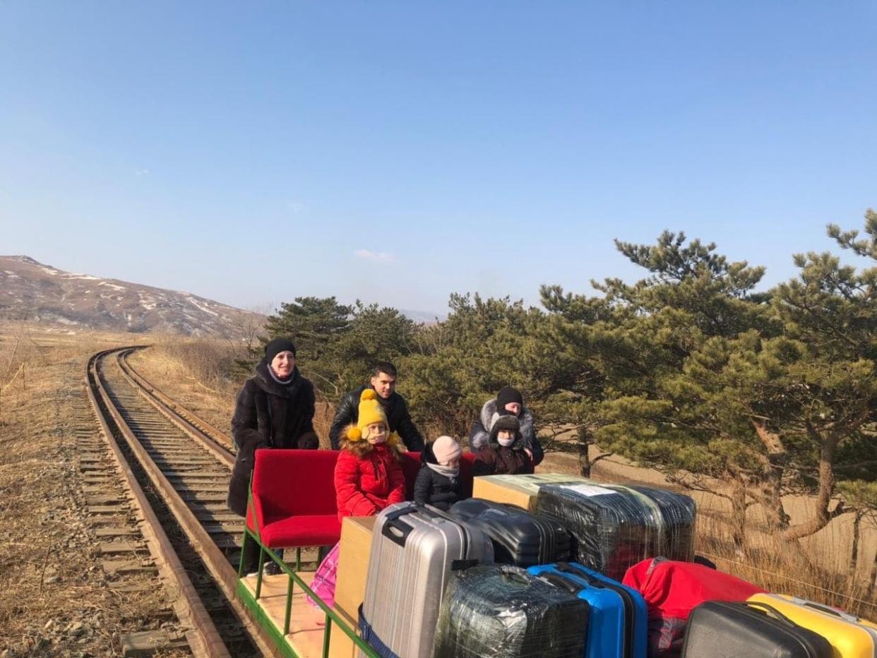 <p>Russian diplomat pictured crossing North Korean border on handcar with his family</p> (Russian Foreign Ministry)