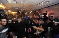 Oct 5, 2014; Kansas City, MO, USA; The Kansas City Royals celebrate in their locker room after defeating the Los Angeles Angels in game three of the 2014 ALDS baseball playoff game at Kauffman Stadium. The Royals won 8-4 advancing to the ALCS against the Baltimore Orioles. Mandatory Credit: John Rieger-USA TODAY Sports