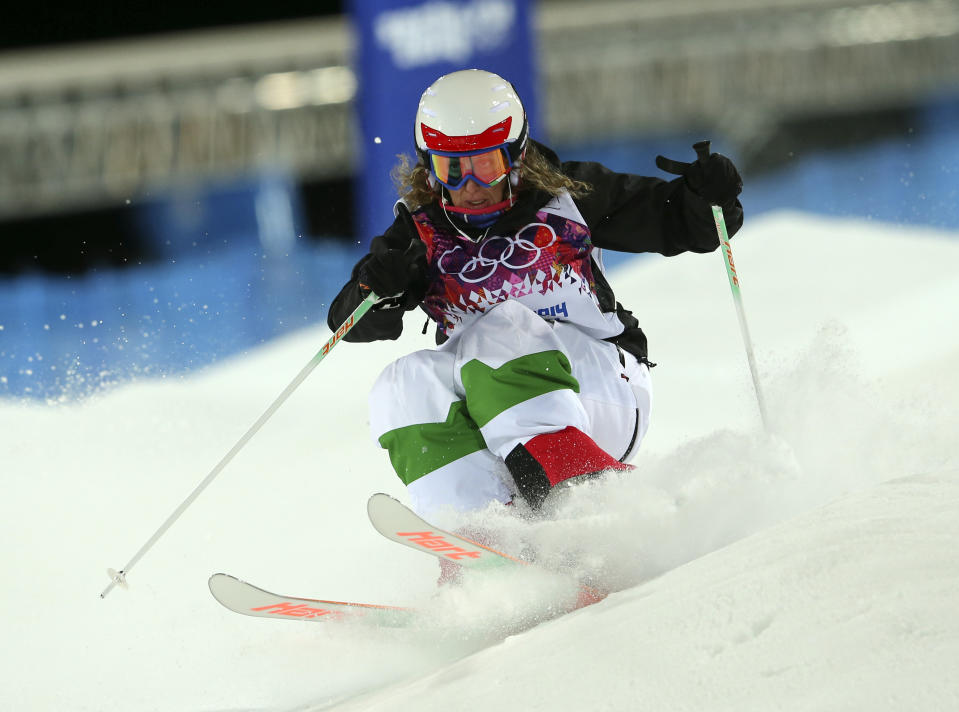 Italy's Deborah Scanzio competes in the women's moguls final 1 at the Rosa Khutor Extreme Park, at the 2014 Winter Olympics, Saturday, Feb. 8, 2014, in Krasnaya Polyana, Russia.(AP Photo/Sergei Grits)