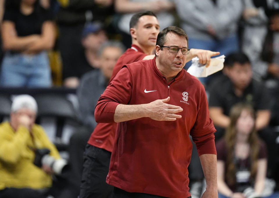 Stanford head coach Jerod Haase directs his team against Colorado in the first half of an NCAA college basketball game, Sunday, March 3, 2024, in Boulder, Colo. (AP Photo/David Zalubowski)