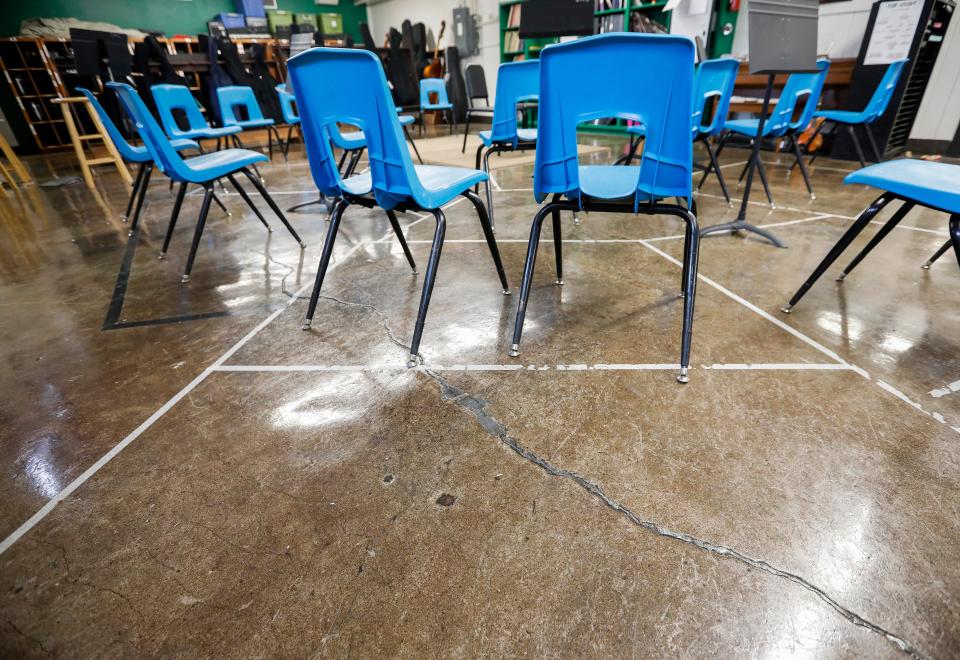 Cracks in the floor of the music room at Jarrett Middle School. The room will also flood in heavy rain.