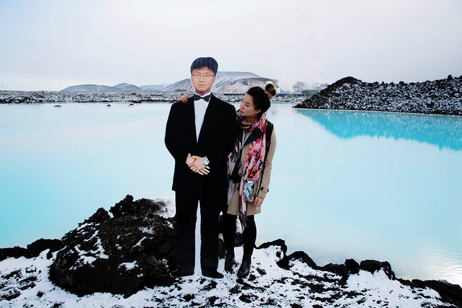 Jinna Yang and a cutout of her father at the Blue Lagoon in Iceland.