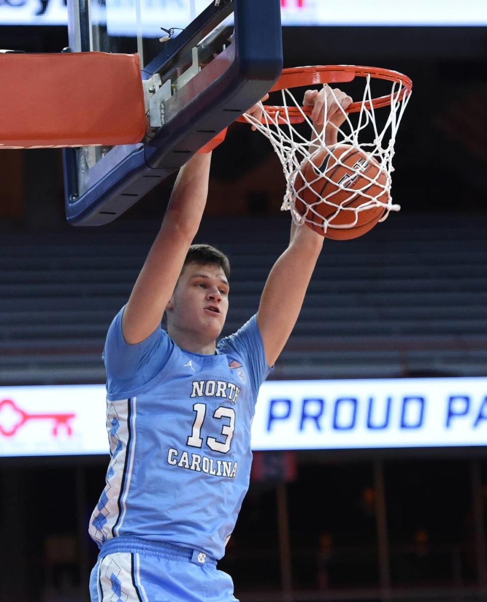 North Carolina Tar Heels forward Walker Kessler (13) with first half dunk in a game between Syracuse and North Carolina at the Carrier Dome in Syracuse N.Y. March 1, 2021. Dennis Nett | dnett@syracuse.com