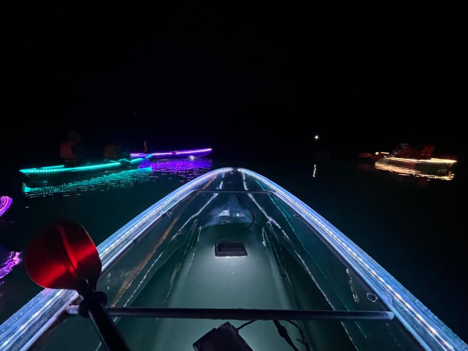 Clear kayaks shine different colors on Wallowa Lake after dark on Sept. 24.