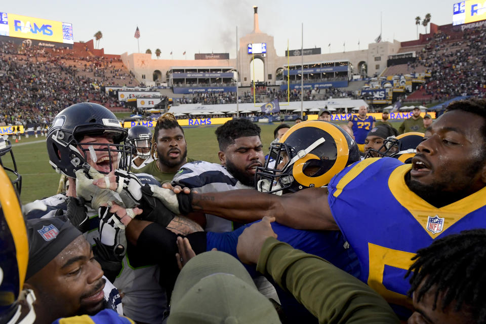 The Rams, mixing it up with some Seahawks last Sunday, look forward to playing a home game in L.A. instead of the originally scheduled Mexico City. (AP)