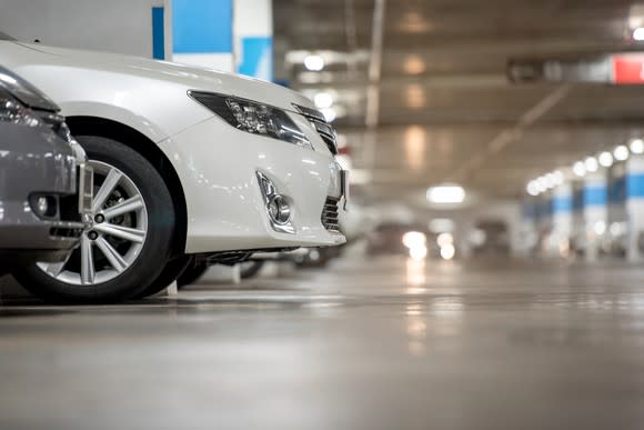 A parking garage with vehicles