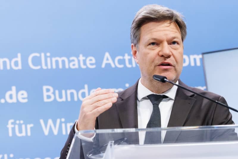 German Minister for Economic Affairs and Climate Protection, Robert Habeck, presents the greenhouse gas emissions data for 2023 and the projection data up to 2030 at a press conference in Berlin. Carsten Koall/dpa