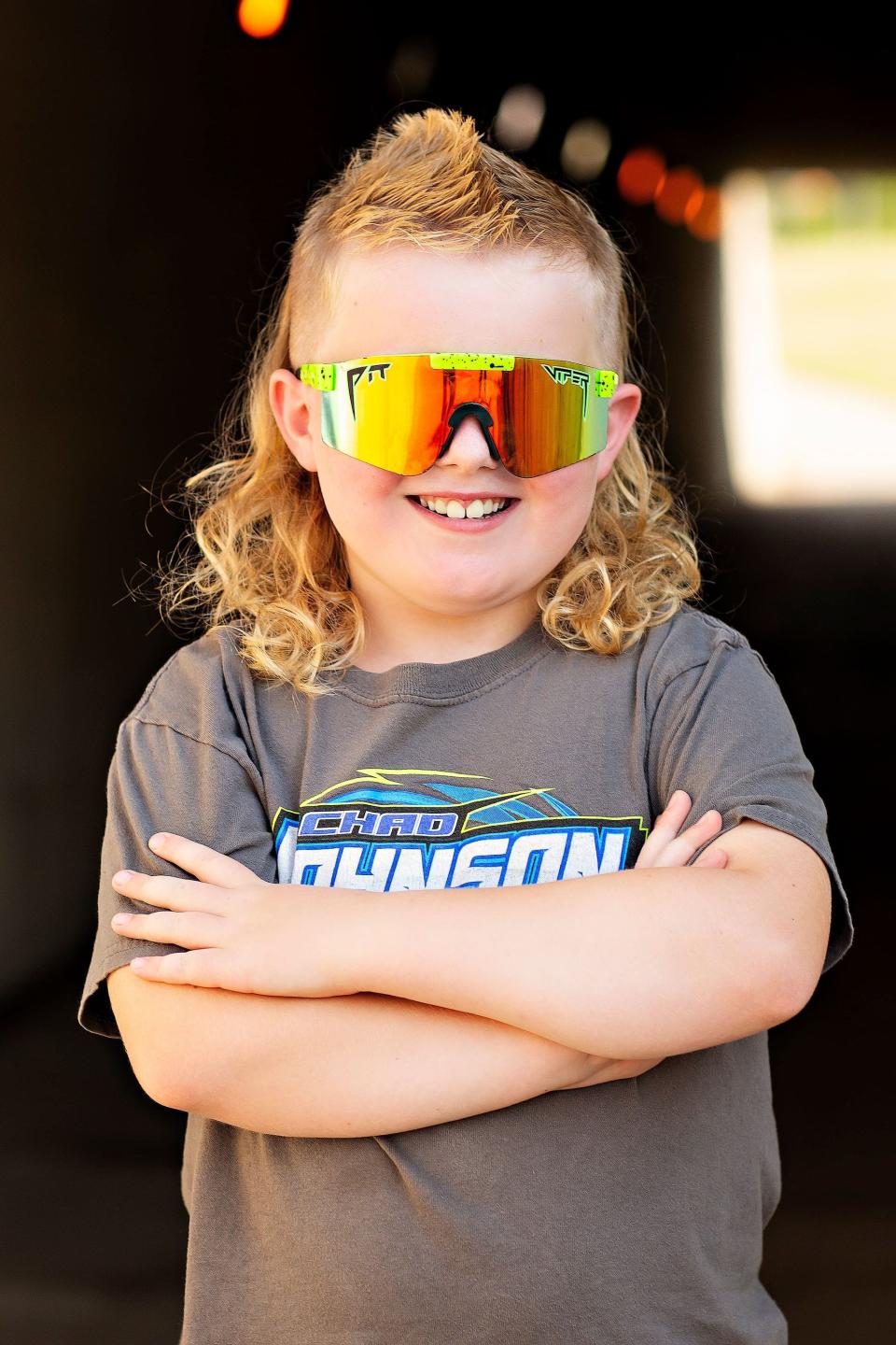 Emmitt Bailey, 8 of Menomonie, poses for his 2022 USA Mullet Championships submission photos.