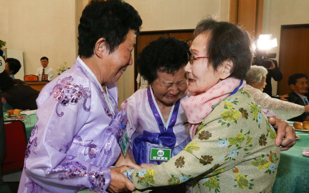 South Korean Han Shin-ja, 99, meets with her North Korean daughters Kim Kyong Sil, 72, and Kim Kyong Young, 71 - AFP