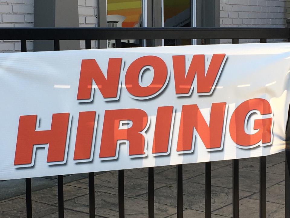 Now hiring help wanted sign