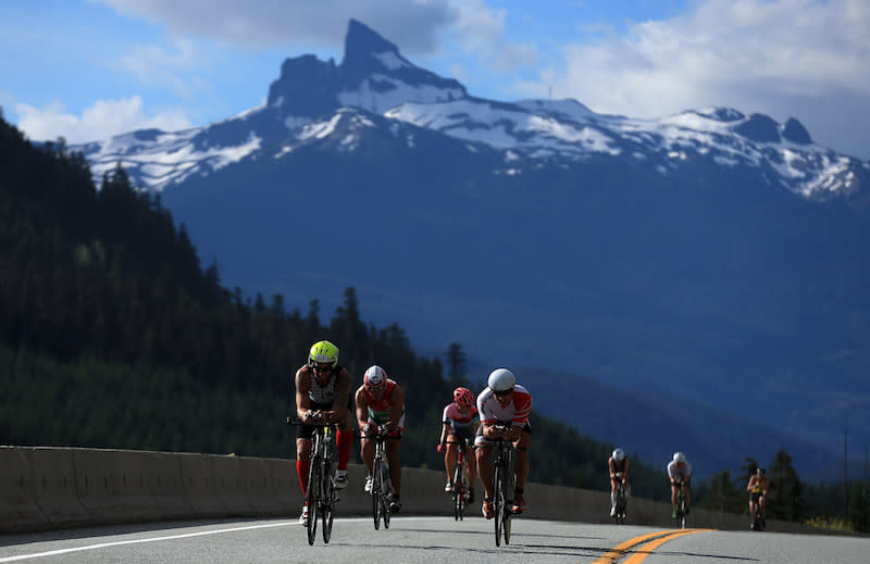 Cyclists ride in Whistler, B.C., during a warm day in July 2017. The mountain community set a new daily temperature record on May 14, 2018, as a heatwave sweeps through the province. Photo from Getty Images.