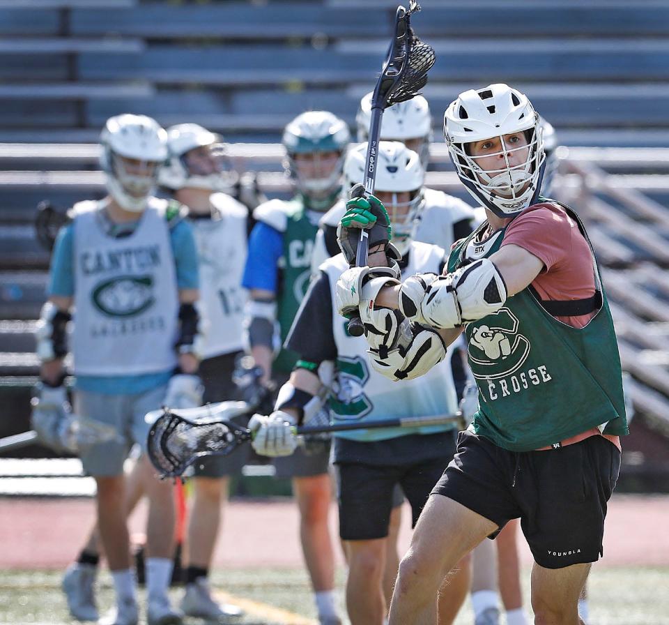 Canton High boys lacrosse scoring ace senior Sam Carlino winds up for a shot at practice on Wednesday, May 25, 2022.