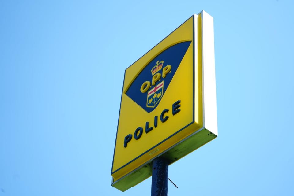 The Ontario Provincial Police logo is seen on the sign at the detachment in Kanata on May 11, 2023. (Jillian Renouf/CBC - image credit)