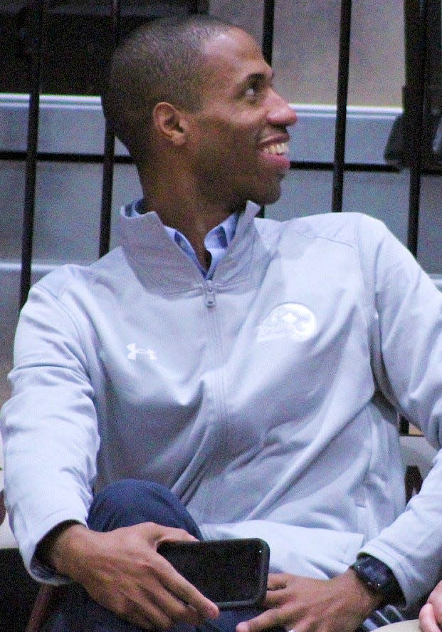 Clent Stewart visits with a Bartlesville High fan in the stands during a game night the past couple of seasons.