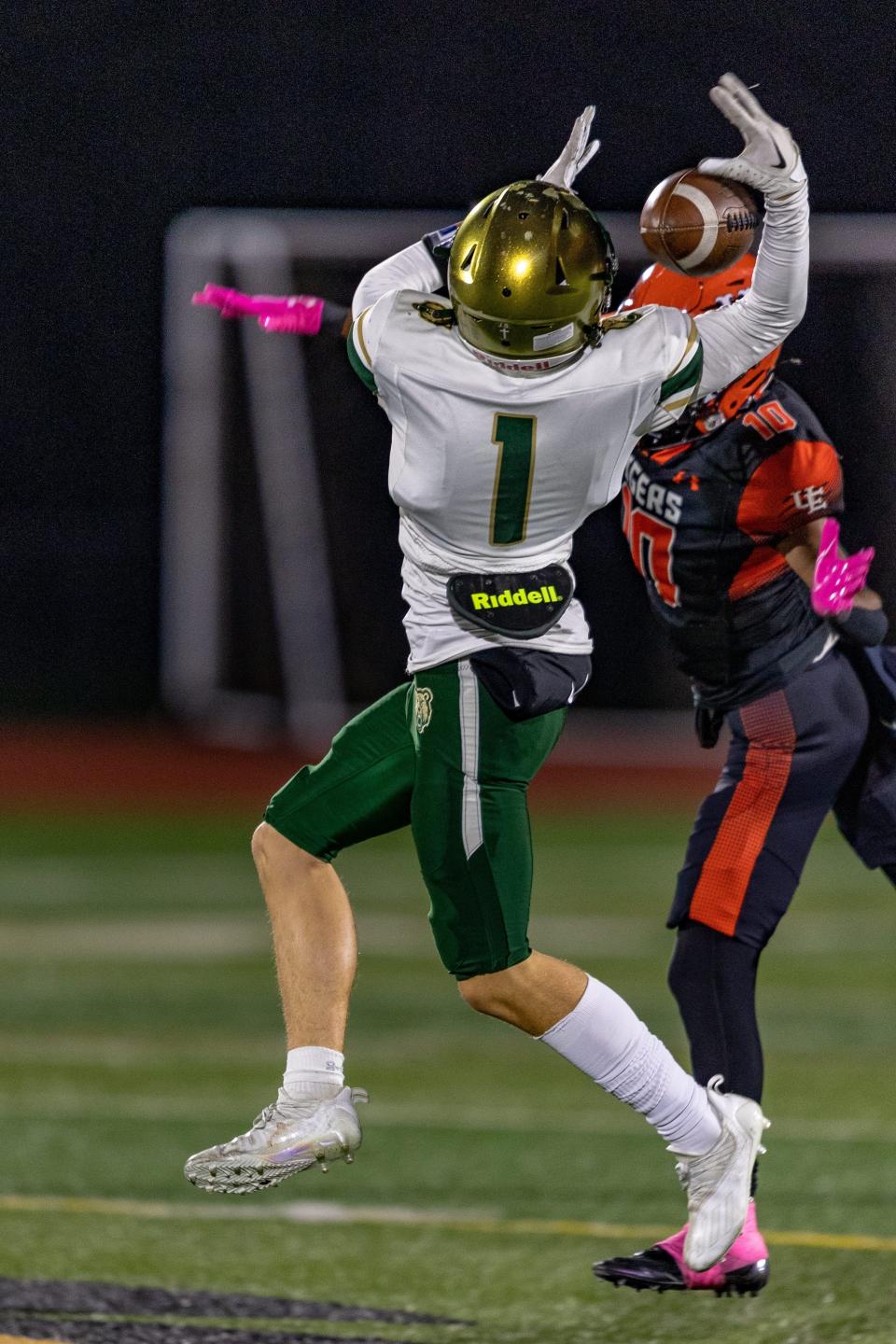 Vestal's Jack Gannon (1) goes up for a pass as Union-Endicott's Latrail Jones Jr. (10) defends during U-E's 12-7 win in football Oct. 21, 2022 at Ty Cobb Stadium.