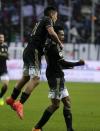 Football Soccer - Frosinone v Juventus Serie A - Matusa Stadium, Frosinone, Italy - 07/02/16. Juventus' Juan Cuadrado (R) celebrates with his team mate Paulo Dybala after scoring against Frosinone. REUTERS/Max Rossi