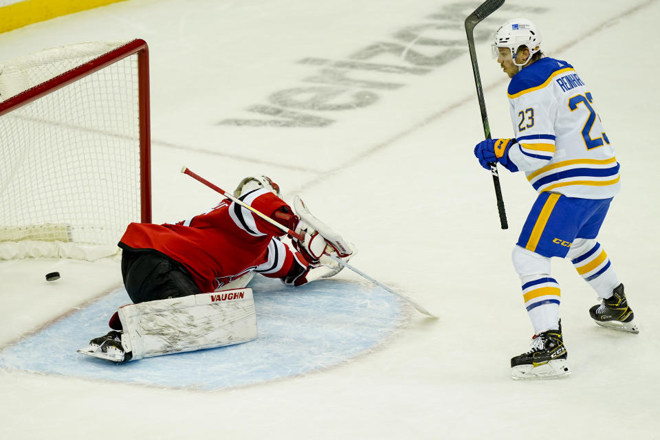 Buffalo Sabres center Sam Reinhart (23) reacts after he scores on New Jersey Devils goaltender Mackenzie Blackwood (29) for a second time in the second period of an NHL hockey game, Saturday, Feb. 20, 2021, in Newark, N.J. (AP Photo/John Minchillo)