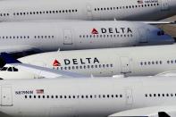 FILE PHOTO: Delta Air Lines passenger planes parked in Birmingham