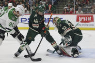 Dallas Stars center Tyler Seguin (91) scores a goal against Minnesota Wild goaltender Filip Gustavsson (32) during the second period of Game 4 of an NHL hockey Stanley Cup first-round playoff series Sunday, April 23, 2023, in St. Paul, Minn. (AP Photo/Stacy Bengs)