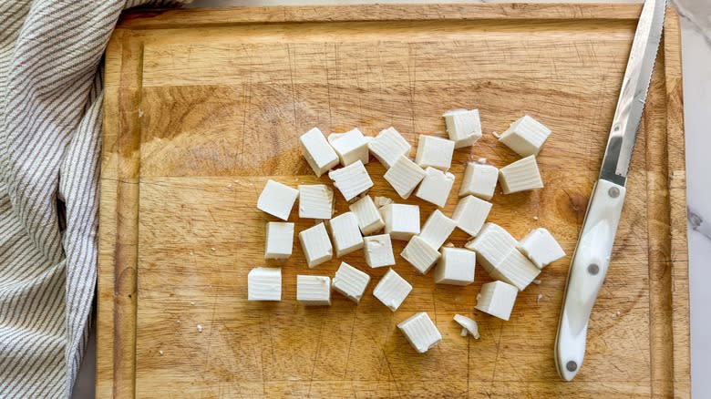 cubed tofu on board