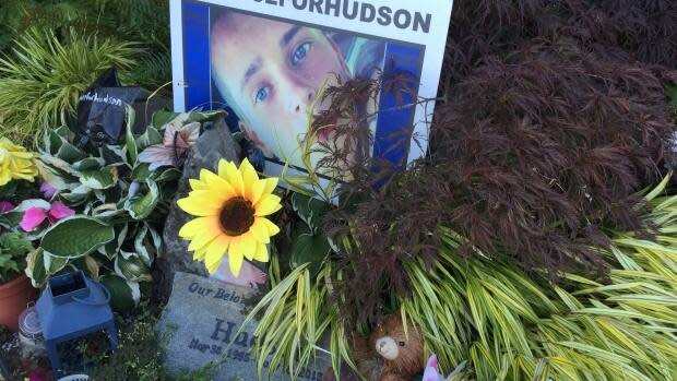 A memorial to Hudson Brooks outside the Surrey RCMP detachment in September 2017. (Jesse Johnston/CBC - image credit)