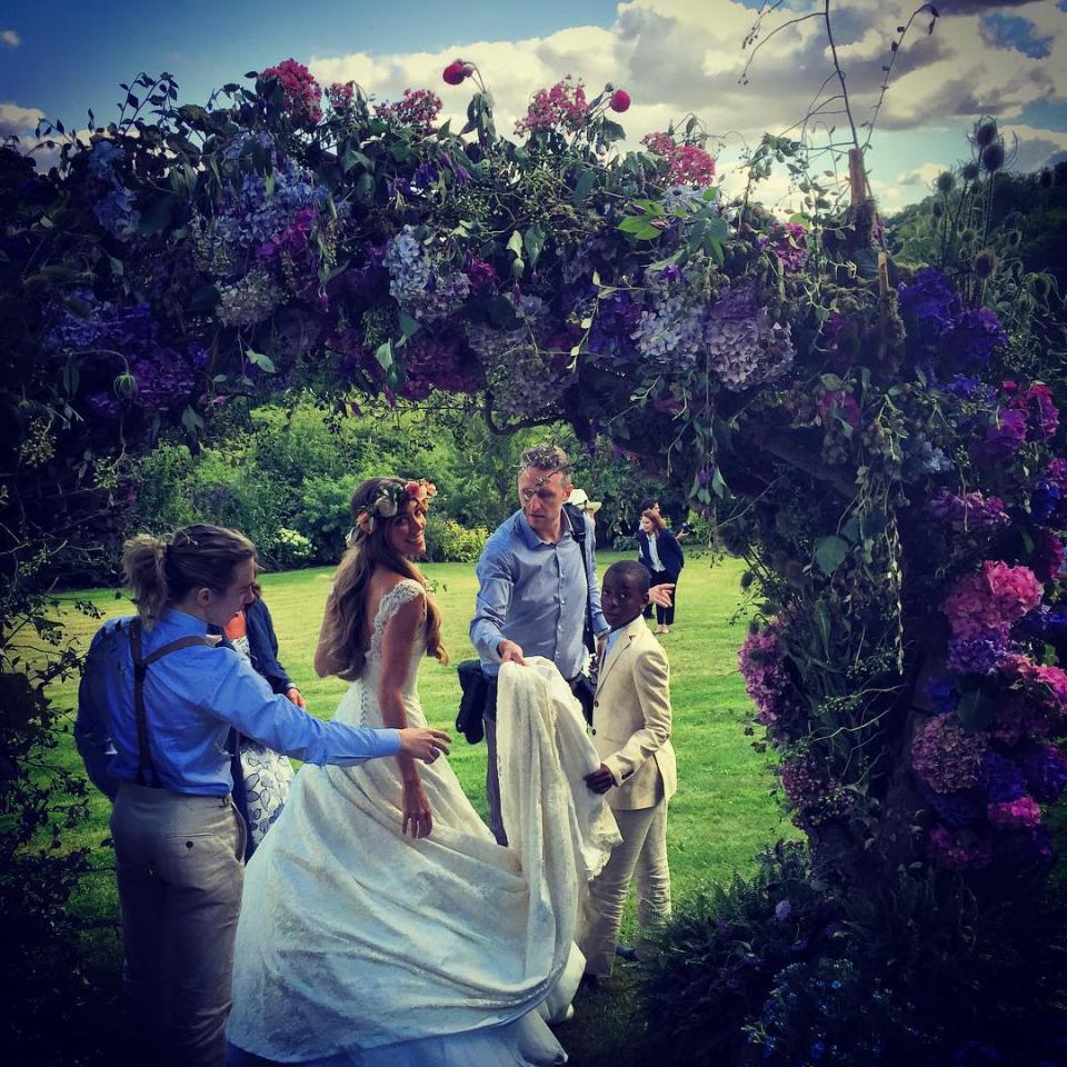 Congrats are in order for director Guy Ritchie, who married model girlfriend Jacqui Ainsley at the couple’s home in Wiltshire, England on Thursday. <strong>WATCH: 9 Celebrity Weddings We're Still Waiting For </strong> The star-studded guest list included many of Ritchie’s A-list friends like David Beckham, Brad Pitt and Jason Statham. Guests shared pics of the big day on Instagram, tracking the event with the hashtag "#jaxguyjuly" and the shots feature many famous faces. Statham snapped a selfie with girlfriend Rosie Huntington-Whiteley and friends, including <em>Batman v Superman: Dawn of Justice</em> star Henry Cavill, who stars in Ritchie's upcoming spy adaptation <em>The Man from U.N.C.L.E..</em> <strong>PICS: The Biggest Celebrity Weddings of 2015 </strong> Other guests snapped shots of Pitt and Beckham looking dapper at the couple’s beautiful Ashcombe estate. <strong>WATCH: The 7 Best Wedding Movies of All Time </strong> Ritchie himself even shared some snaps from the big day, posting a selfie with his groomsmen on a plane before the ceremony, celebrating "the beginning of something fun." Ritchie and Ainsley have been dating since April 2010 and are parents to three children, 3-year-old son Rafael, 2-year-old daughter Rivka and 1-year-old son Levi. It’s the second wedding for Ritchie, who was married to Madonna from 2000 to 2008. The couple share two sons, 14-year-old Rocco and 9-year-old David. <strong>WATCH: Celebrity Summer Wedding Watch: Who's Getting Hitched? </strong>