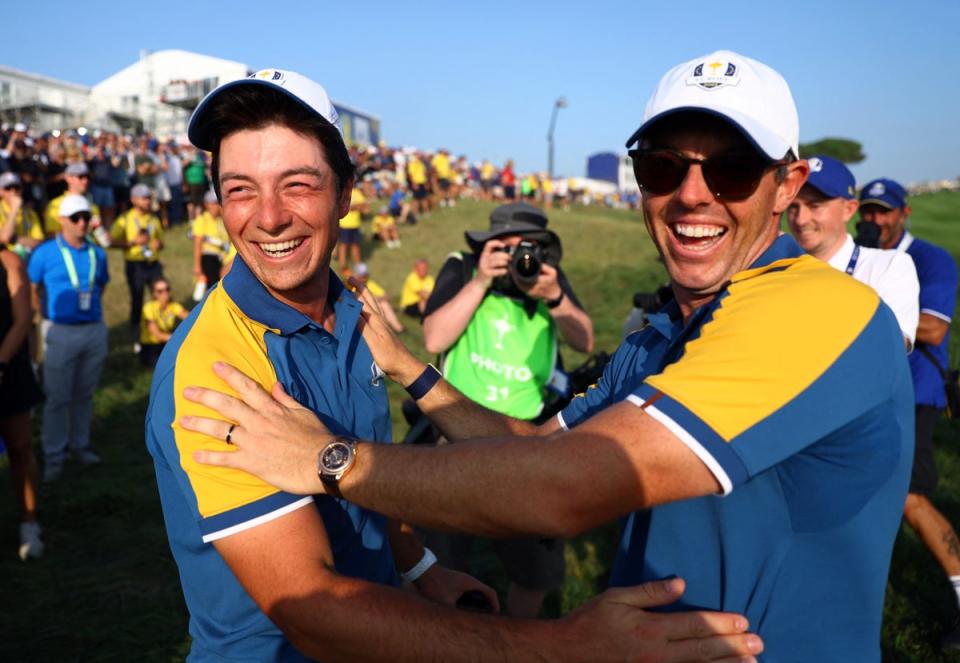 Rory McIlroy celebrates with Viktor Hovland (Reuters)
