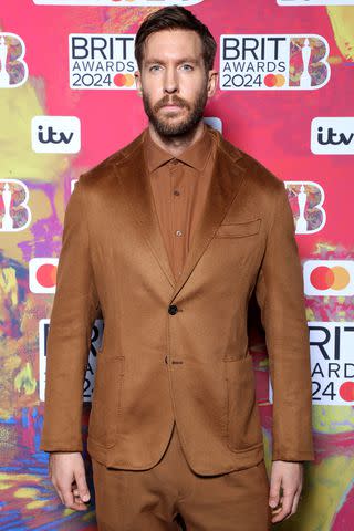 <p>JMEnternational/Getty</p> Calvin Harris attends the BRIT Awards in London on March 2, 2024