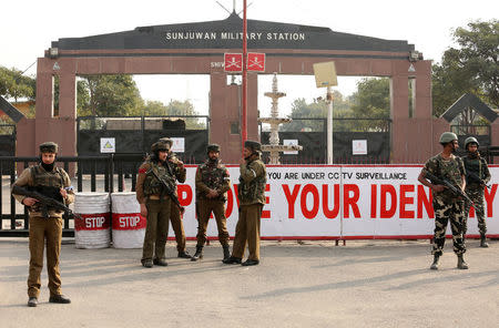 Indian army soldiers stand guard outside an army camp after suspected militants attacked the camp, in Jammu February 10, 2018. REUTERS/Mukesh Gupta