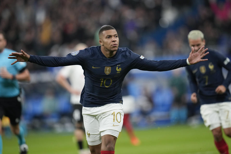 France's Kylian Mbappe celebrates scoring his side's first goal during the UEFA Nations League soccer match between France and Austria at the Stade de France stadium in Saint Denis, outside Paris, France,Thursday, Sept. 22, 2022. (AP Photo/Christophe Ena)