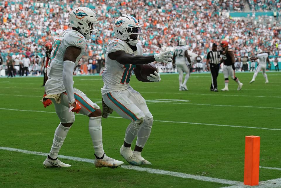Miami Dolphins wide receiver Tyreek Hill (10) celebrates a touchdown against the Cleveland Browns in the third quarter with wide receiver Jaylen Waddle (17) at Hard Rock Stadium in Miami Gardens, Nov. 13, 2022.

Photos Cleveland Browns V Miami Dolphins 31