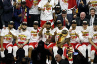 The Toronto Raptors pose for a photo after their team defeated the Golden State Warriors to win Game Six of the 2019 NBA Finals at ORACLE Arena on June 13, 2019 in Oakland, California. (Photo by Lachlan Cunningham/Getty Images)