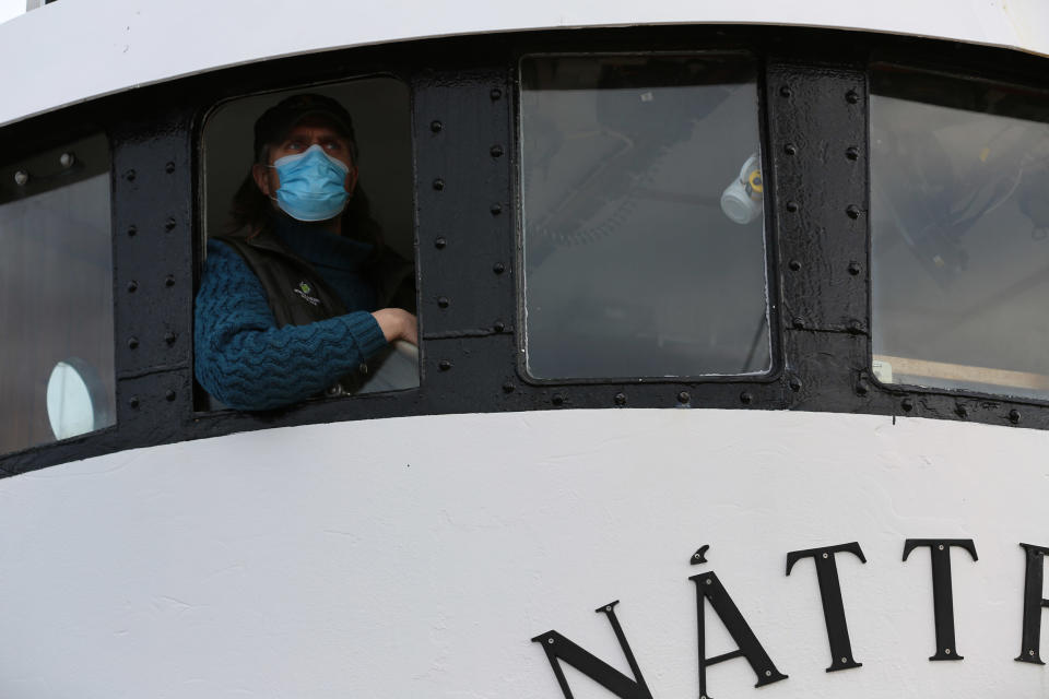 Image: Captain Heimir Hardarson, on his boat in Husavik, Iceland. (Carlo Angerer / NBC News)