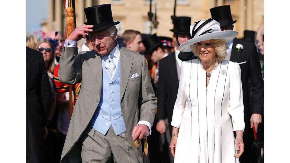 King Charles III and Britain's Queen Camilla attend a Royal Garden Party at Buckingham Palace, central London, on May 8, 2024. (Photo by Jordan Pettitt / POOL / AFP) (Photo by JORDAN PETTITT/POOL/AFP via Getty Images)