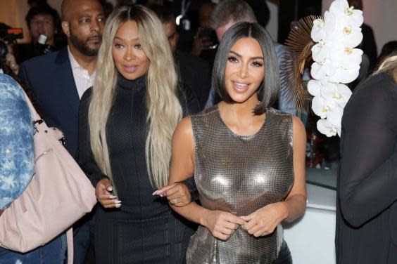 La La Anthony and Kim Kardashian West sat together to see Williams' new collection (AP)