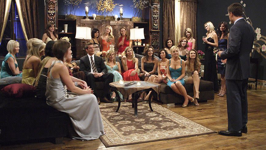 Erin (centre in the red dress) with her fellow 'Bachelor' contestants. Source: Getty