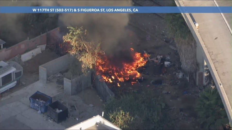 Another fire burns underneath Los Angeles freeway 