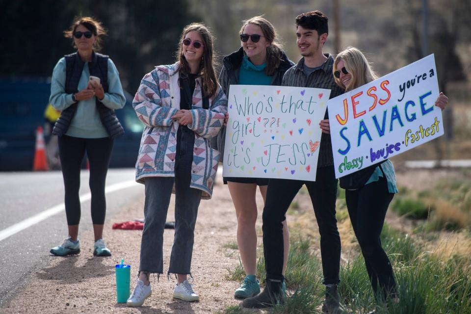 Friends and family cheer on their loved ones as they race in the Colorado Marathon in Fort Collins on Sunday, May 1, 2022.