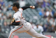San Francisco Giants relief pitcher Randy Rodríguez works against the Colorado Rockies in the fifth inning of a baseball game Thursday, May 9, 2024, in Denver. (AP Photo/David Zalubowski)