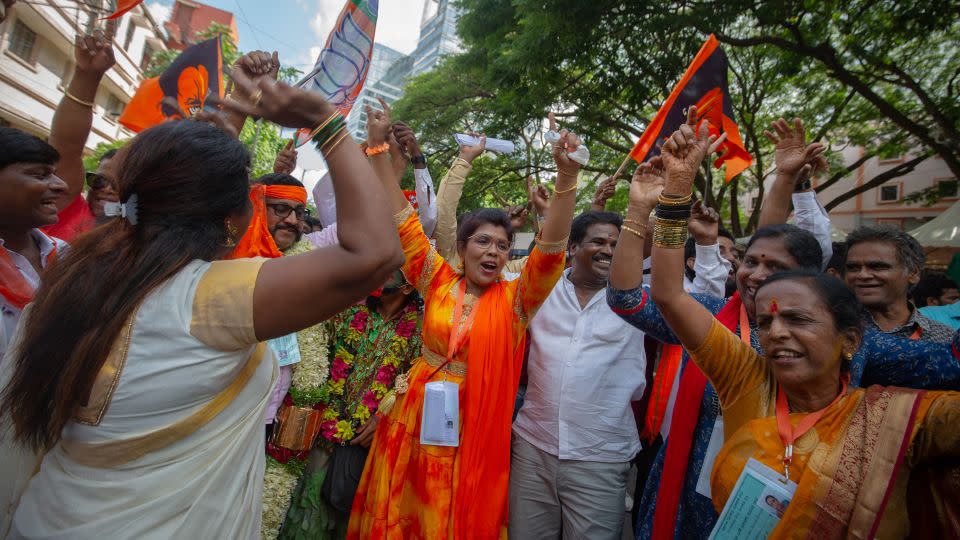 Supporters of the Bharatiya Janata Party (BJP) celebrate as they learn early election results on June 04, 2024 in Bengaluru, India. - Abhishek Chinnappa/Getty Images