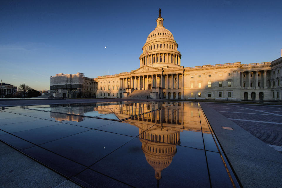 The U.S Capitol is seen at sunrise, Sunday, March 24, 2019, in Washington. The special counsel's report on how the Russians tried to influence the 2016 presidential election and any involvement with the Trump campaign is being boiled down to a summary of key findings. That summary is expected to be released to Congress and the public sometime Sunday. (AP Photo/Alex Brandon)