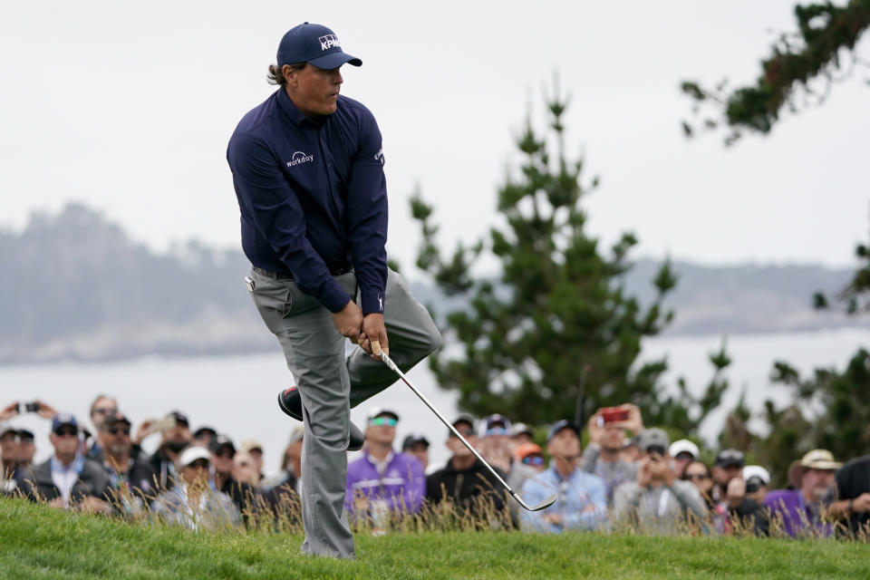 Phil Mickelson reacts to a shot on the 12th hole during the second round of the U.S. Open golf tournament Friday, June 14, 2019, in Pebble Beach, Calif. (AP Photo/Carolyn Kaster)
