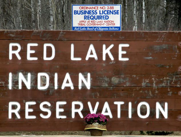 <p>JEFF HAYNES/AFP via Getty</p> Red Lake Indian Reservation sign